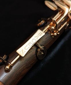 Backun Protege Clarinet - Cocobolo Wood / Rose Gold Keys - Badge